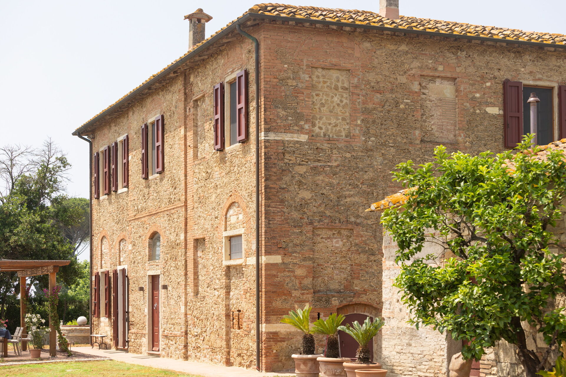 Villa exterior with terraced gardens